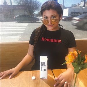 Black T-shirt with Romance in cute font